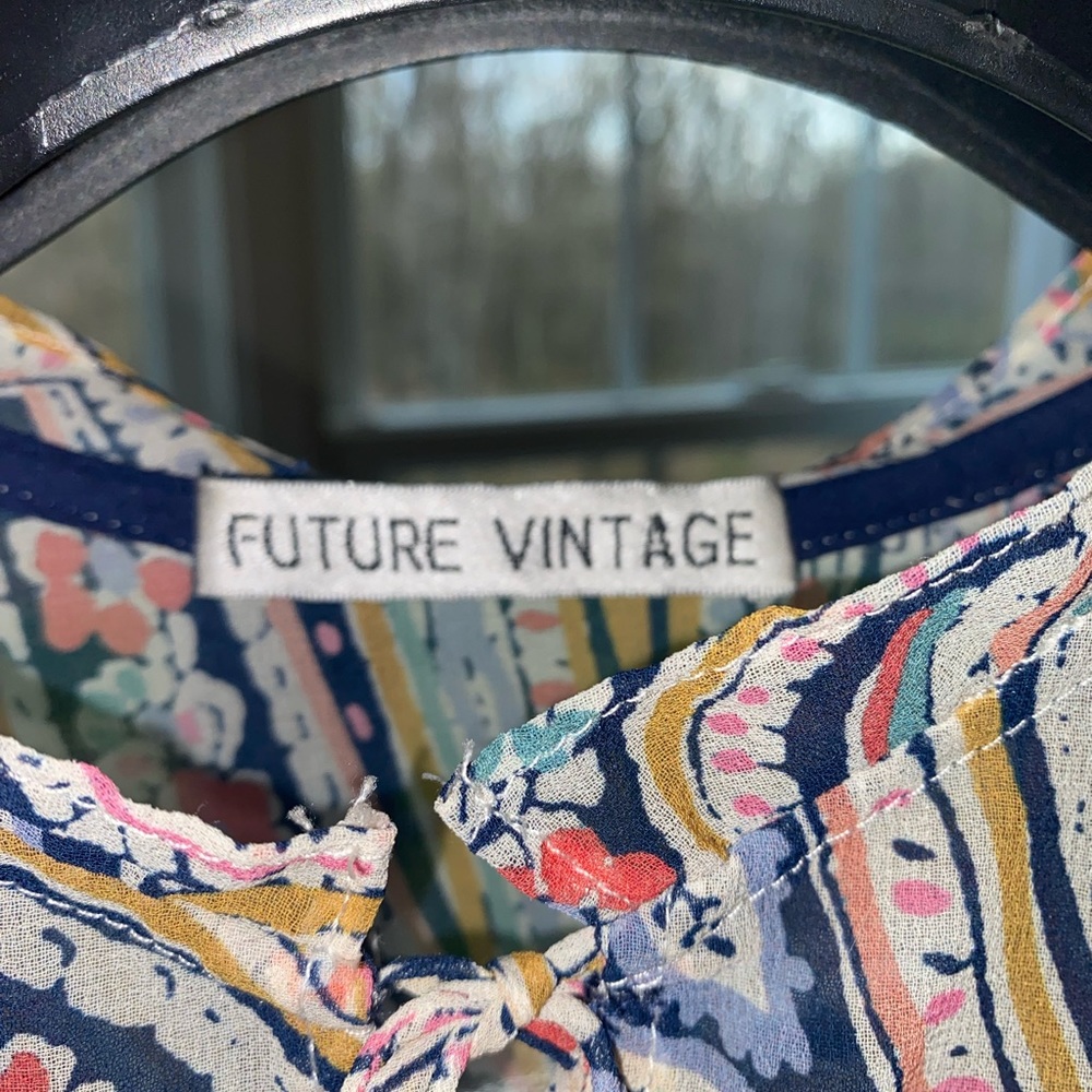 Anthropology mesh blouse size small.